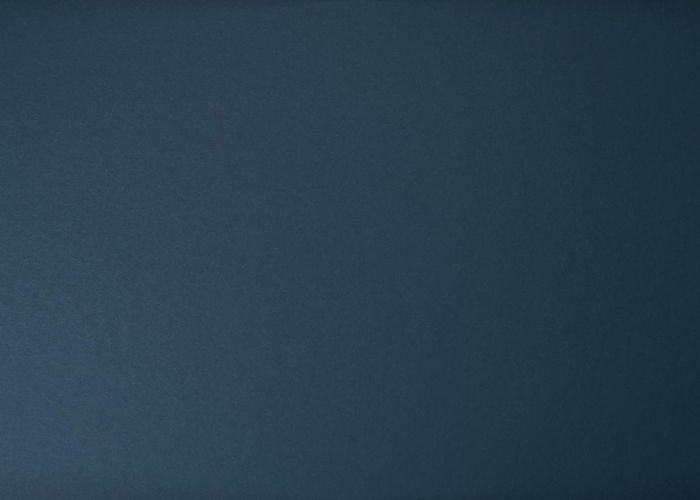 Dark minimalist space with soft lighting